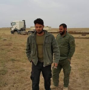 صورة للشاب خالد الصياد حمال راية العباس "ع"